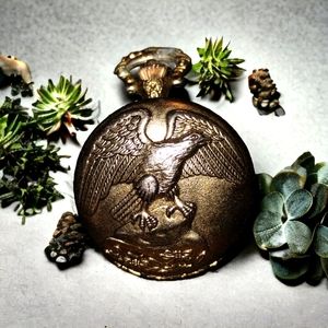 Watch-It old vintage pocket watch a beautiful golden color with eagle